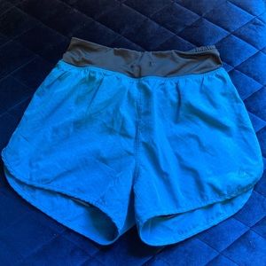 Athletic shorts with built in compression shorts